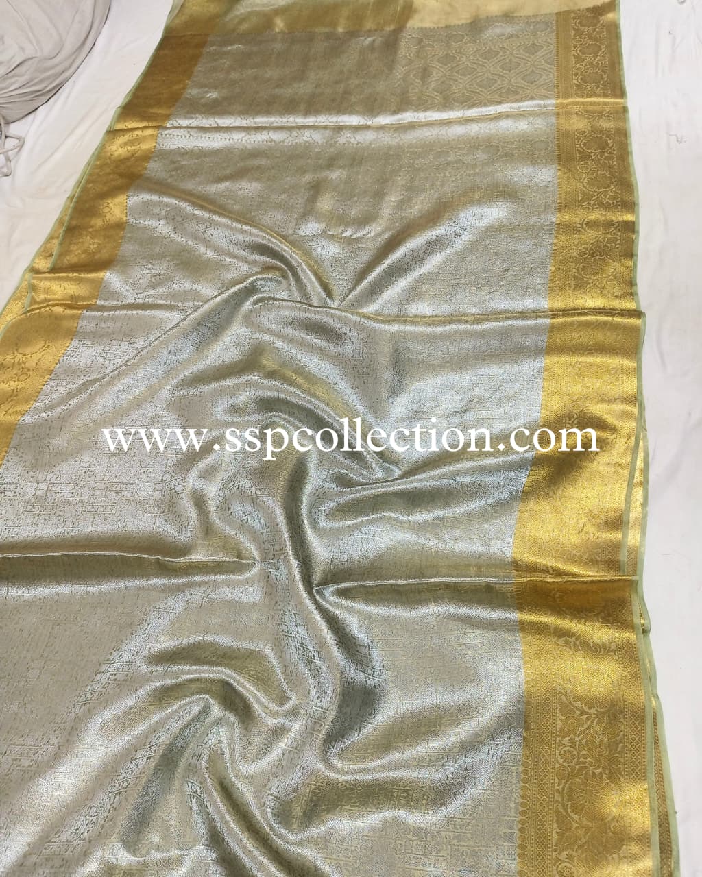 Pista-Green Pure Molten Tissue Silk Brocade Banarasi Saree